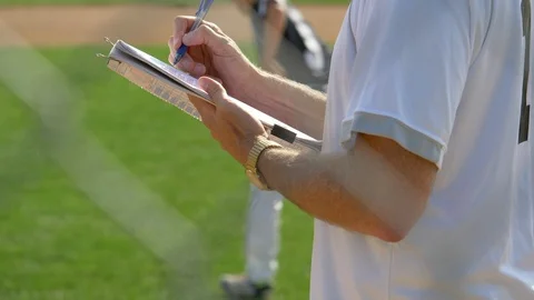 A coach with his clipboard notebook in a... | Stock Video | Pond5
