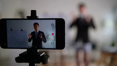 Coach manager presentation pitching online in improper suit half dressed shorts. Video stock 170626451