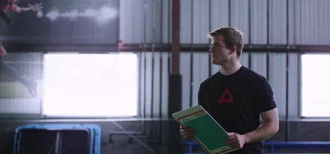 Coach measuring the distance on the ground Stock Footage 77332222