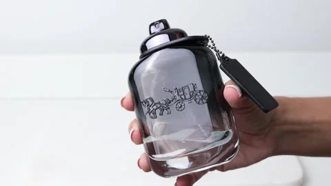 Coach perfume for him Stock Footage 195477443