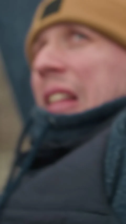 Coach Pushing Through Fatigue During Intense Workout on Iron Bar Stock Footage 317575134