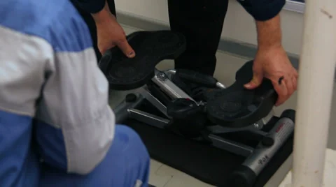 Coach regulates walking trainer. Stock Footage 37886691