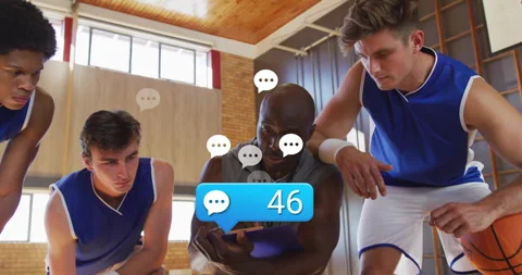 Coach viewing basketball data on tablet with players, showing animated chart Vídeo Stock 307973546