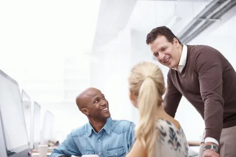 Coaching, computer and web development with business people in creative Stock Photos