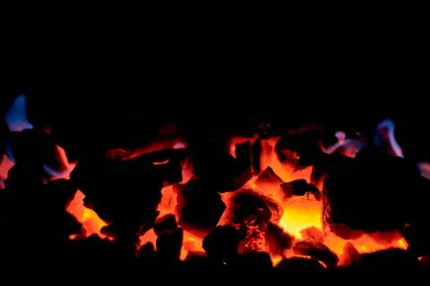 Coal anthracite. Burning solid fuel. Stock Photos