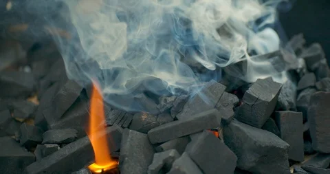 Coal burning in a brazier grill Stock Footage 101662091