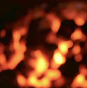 Coal burning in open fire - fire background Stock Photos