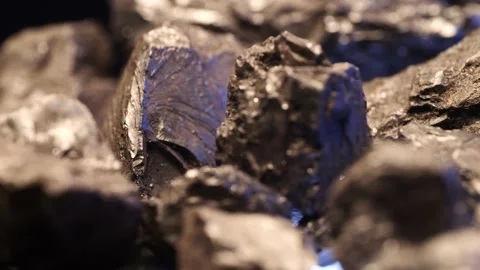 Coal closeup sliding out Stock Footage 229708006
