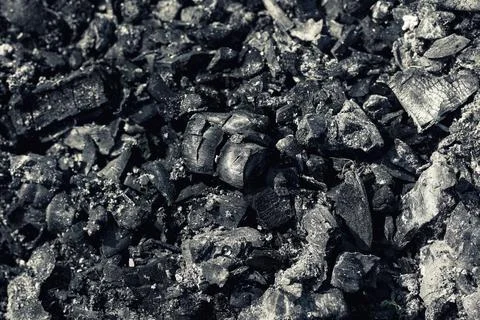 Coal is combustible black rock consisting mainly of carbonized plant Stock Photos