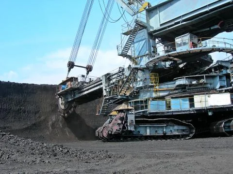 Coal digger in action Stock Photos