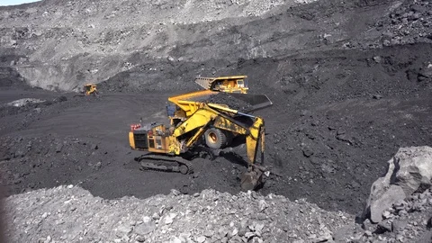 Coal filling backet &amp; loading tip truck 4K 24p Stock Footage 90493882