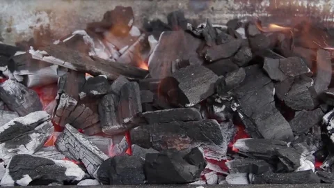 Coal in fire for a barbecue grill Video stock 84802830