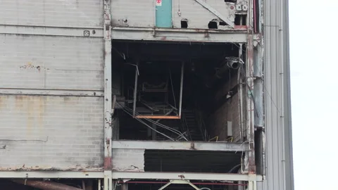 Coal fired electrical power generation station being demolished Stock Footage 158175779