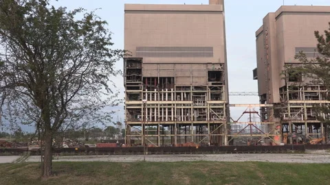 Coal fired electrical power generation station being demolished Stock Footage 158179375