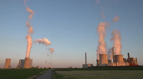 Coal-fired power stations at sunset Stock Footage 52998972