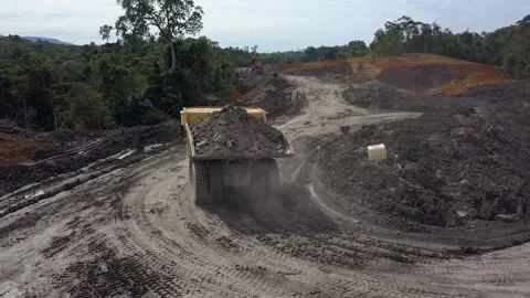 Coal getting activities in coal mining in Kalimantan Stock Footage 241778277