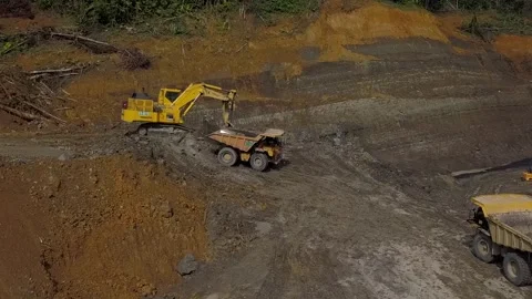 Coal getting activities in coal mining in Kalimantan Stock Footage 241789923