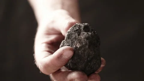 Coal in the hand of a miner. Stock Footage 198854681