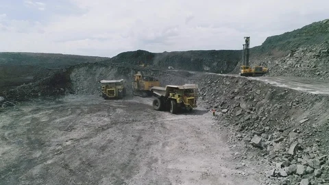 Coal loading into a dump truck aerial video Stock Footage