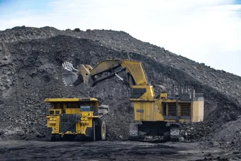 Coal loading into a dump truck 스톡 사진