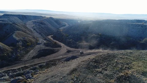 A coal mine, the bottom rides a tiny car Stock Footage 122607689
