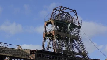 Coal mine pit head winding wheel derelict abandoned decay Stock Footage 85897630