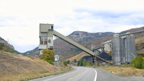 Coal mining industry with large conveyer across the road.in Gunnison nation.. Video stock 320085063