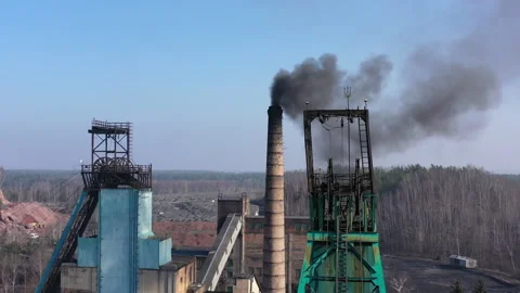 Coal mining mine. Thick smoke comes out of the chimney. Adverse outdated working Stock Footage 175363464
