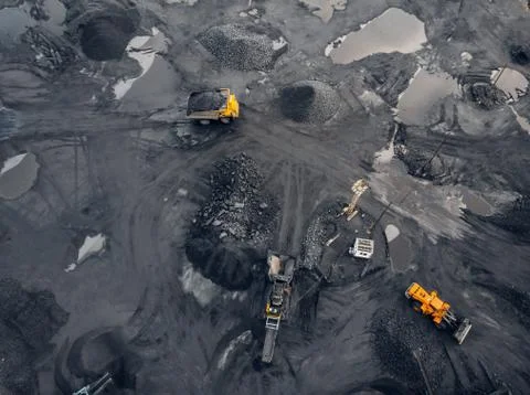 Coal mining an open pit extractive industry, top view aerial Stock Photos