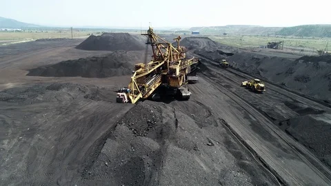 Coal mining open pit mine aerial black Stock Footage