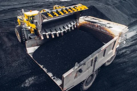 Coal mining at an open pit Stock Photos