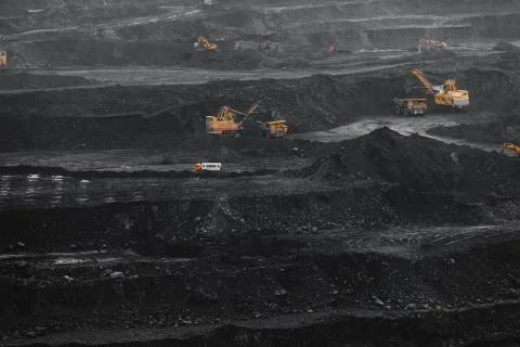 Coal mining at an open pit Stock Photos