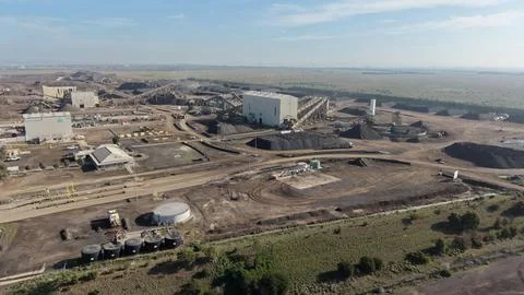 Coal mining operation aerial view with industrial buildings Stock Photos