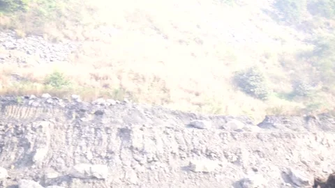Coal mining site with dust pollution, methane gas releasing area Stock Footage 331134096