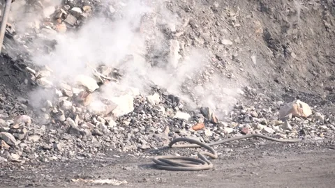 Coal mining site with dust pollution, methane gas releasing area Stock Footage 331135712
