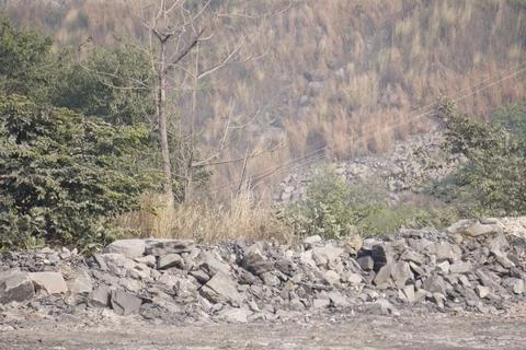 Coal mining site with dust pollution, methane gas releasing area Stock Photos