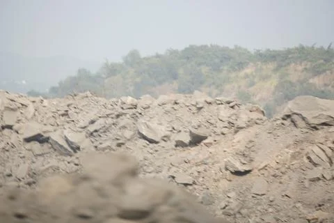 Coal mining site with dust pollution, methane gas releasing area Stock Photos