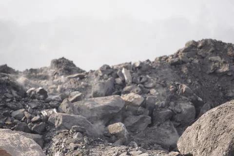 Coal mining site with dust pollution, methane gas releasing area Stock Photos
