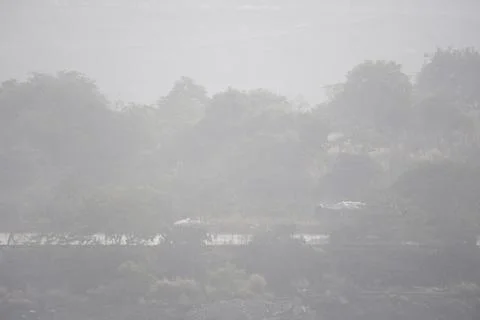 Coal mining site with dust pollution, methane gas releasing area 库存照片