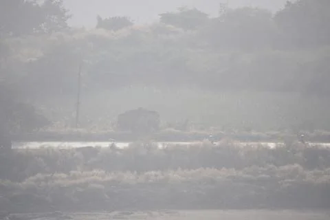 Coal mining site with dust pollution, methane gas releasing area Stock Photos