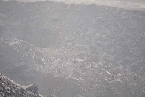 Coal mining site with dust pollution, methane gas releasing area 库存照片