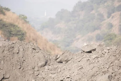 Coal mining site with dust pollution, methane gas releasing area Stock Photos