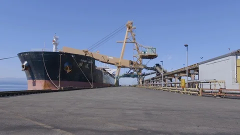 Coal port facility loading ship Stock Footage 103347918