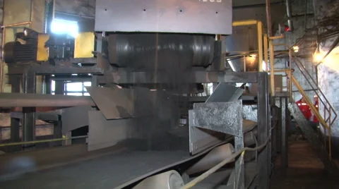 Coal poured into the conveyor 2 Stock Footage 56376316