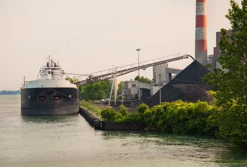 Coal ship unloading Stock Photos