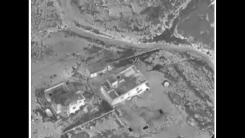 Coalition Strike on ISIL Building 1 20 Feb 15 in the vicinity of Sinjar, Iraq Stock Footage 120028676