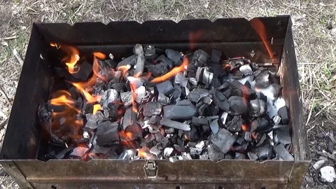 The coals burning in the grill Stock Footage 75476331