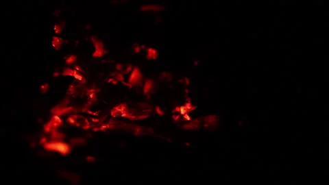 Coals in the dark, a fire. The coals are flickering on the ground. Futazh, a Video stock 137719859