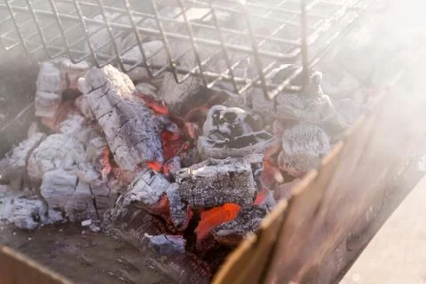 Coals in the grill close-up. Stock Photos
