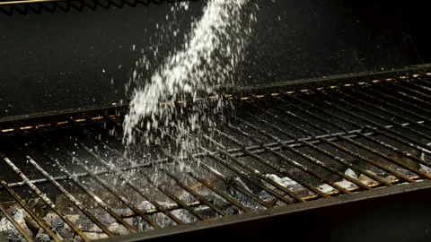 Coals on the grill salt. Selective focus. Stock Footage 259816157